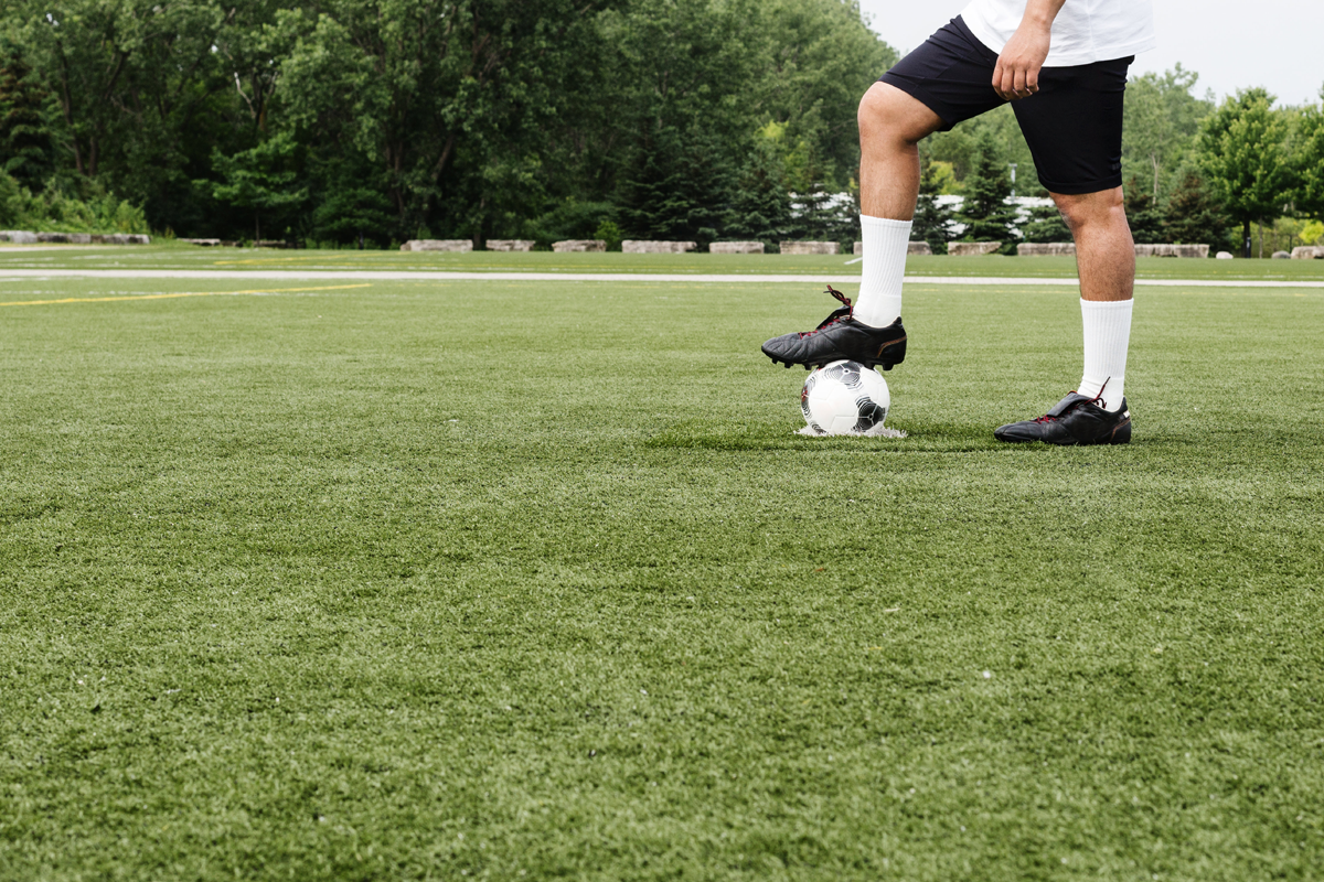 football-player-rests-foot-.png